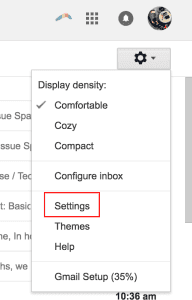 Gmail settings dropdown menu showing display density options and the Settings option.